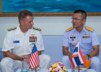 Rear Adm. Joey Tynch visits with Rear Adm. Tawatchai during CARAT 2018.