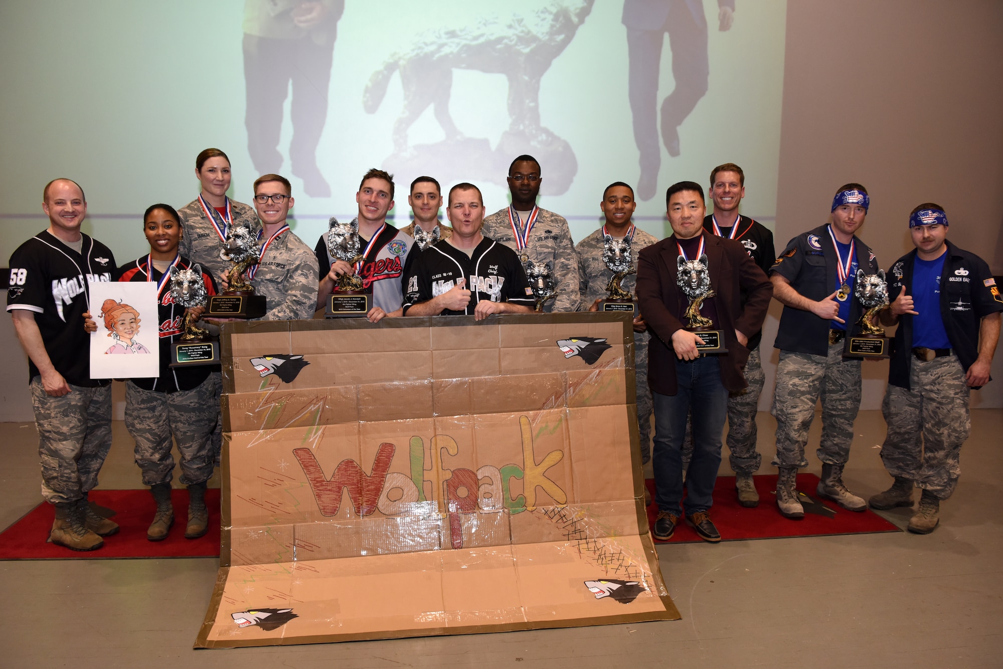 The winners of the 8th Fighter Wing annual awards pose for a photo after the event at Kunsan Air Base, Republic of Korea, Feb. 1, 2019. The winners at the wing level will continue on to compete at the 7th Air Force level. (U.S. Air Force photo by Staff Sgt. Joshua Edwards)