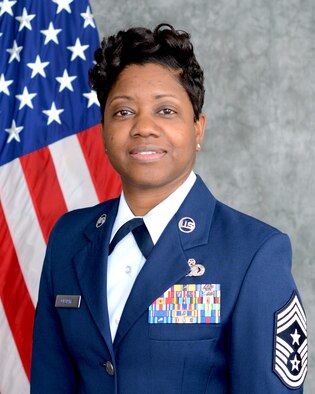 Chief Master Sgt. Takesha Williams, 931st Air Refueling Wing command chief, stands for an official photograph Jan. 24, 2019, at Tinker Air Force Base, Oklahoma. (U.S. Air Force photo by Tech. Sgt. Samantha Mathison)