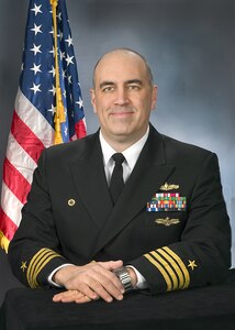 Captain Philip R. Mlynarski, USN, Commanding Officer, AEGIS Technical Representative