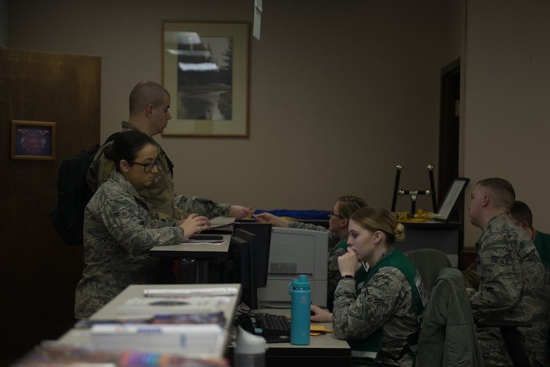 Members of Team Offutt process through the pre-deployment function line Jan. 29, 2019, on Offutt Air Force Base, Nebraska. The exercise tested Offutt’s ability to process and deploy a large amount of personnel and equipment on short notice. (U.S. Air Force photo by Tech. Sgt. Rachelle Blake)