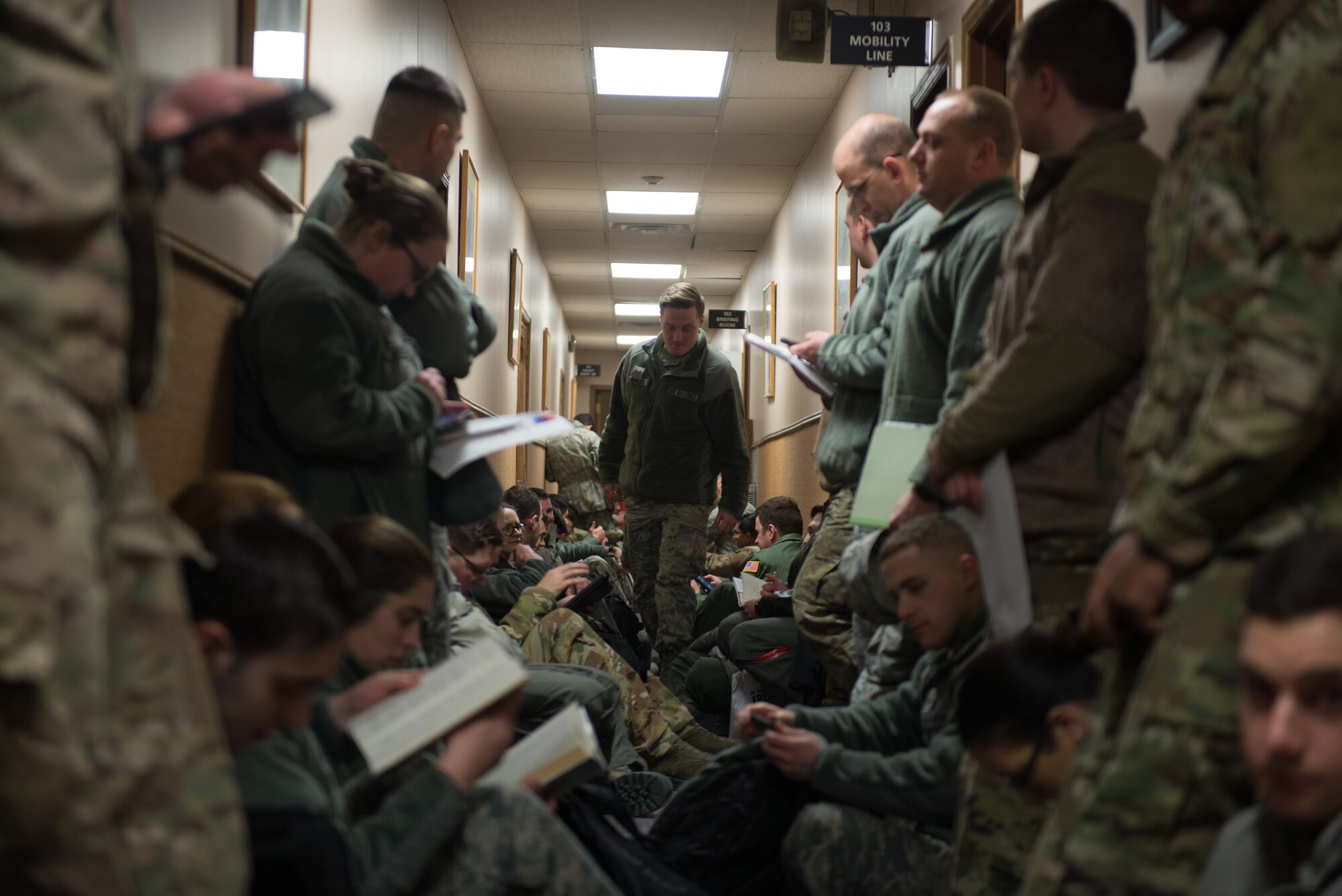 Members of Team Offutt line the walls of the Installation Deployment Readiness Cell Jan. 29, 2019, on Offutt Air Force Base, Nebraska. More than 600 members of the base took part in Phase I of Operational Readiness Exercise Winter Havoc. (U.S. Air Force photo by Tech. Sgt. Rachelle Blake)