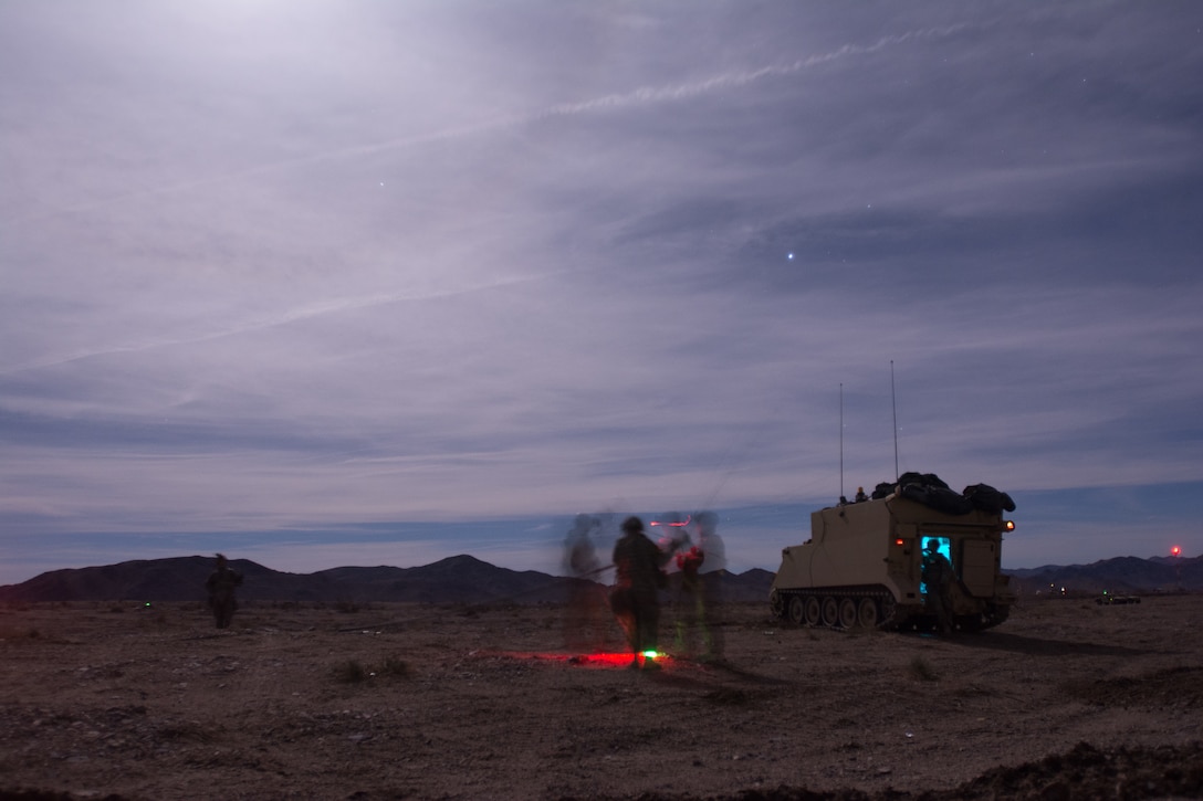 Soldiers set up an OE254 antenna after moving their tactical operations center (TOC).