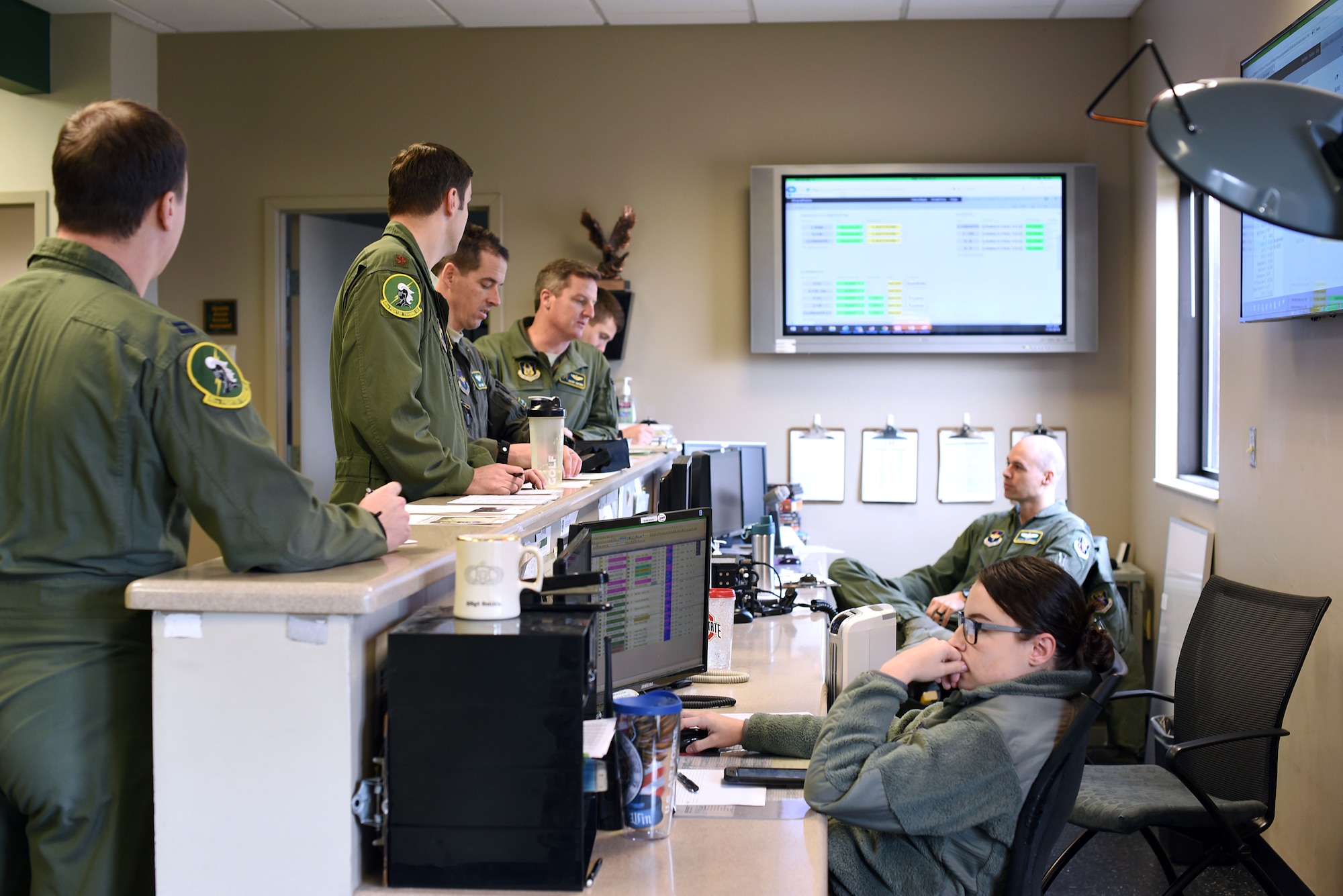 Senior Airman Chelsee Vargne, 49th Fighter Training Squadron aviation resource manager, checks pilots’ flight records before a training mission Jan. 30, 2019, on Columbus Air Force Base, Mississippi. Aviation resource managers that are assigned to flying training squadrons handle squadron aviation resource management documents and day to day training missions. (U.S. Air Force photo by Airman 1st Class Keith Holcomb)