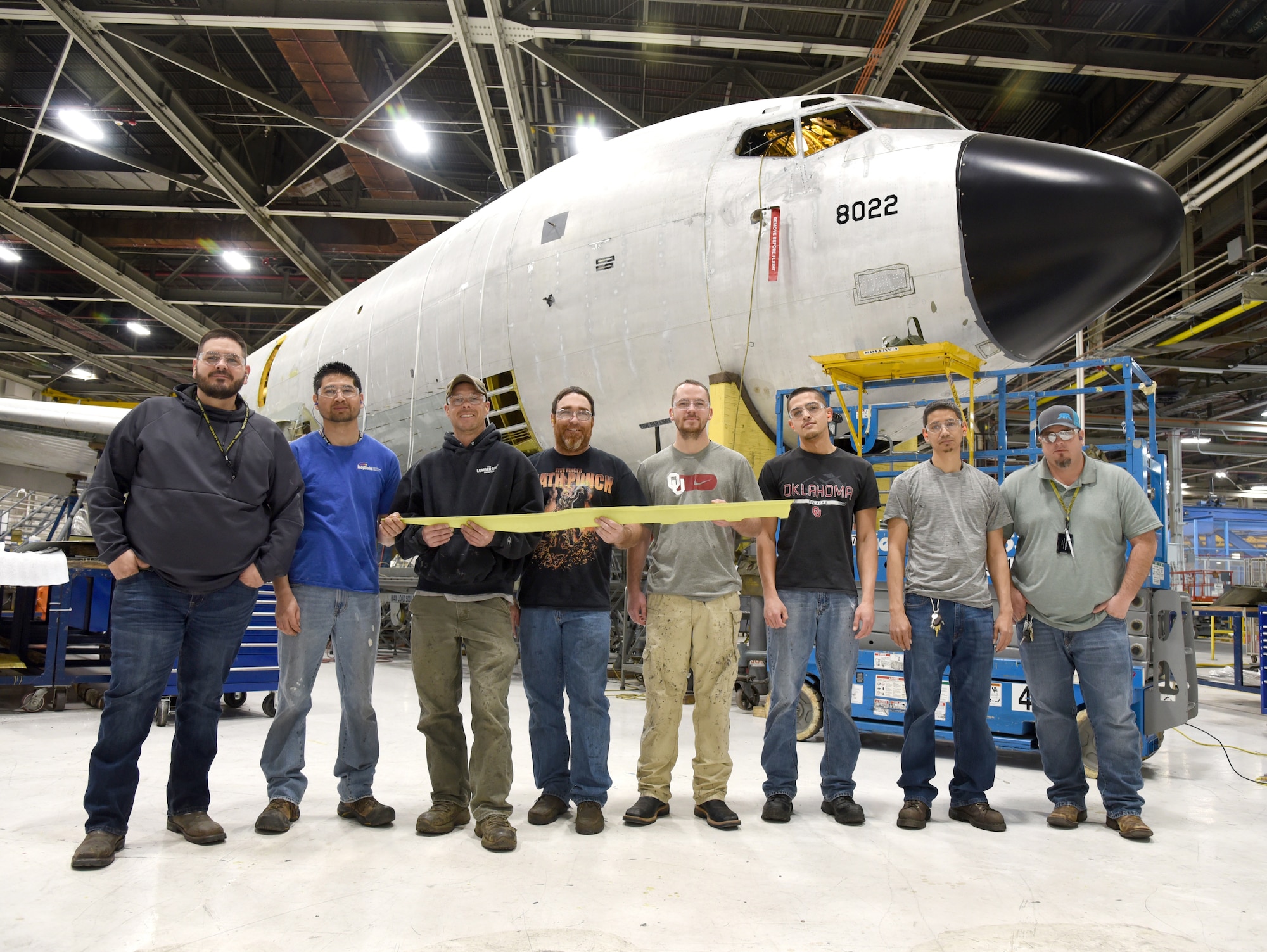 From left, Justin Herndon, Jaime Espinoza, Robert Ingraham, David Matthis, Tyler Smith, Linn Deer, Isaac Leija, Justin Henthorn and Russell Strangfeld (not pictured) made up the team of 564th Aircraft Maintenance Squadron sheet metal mechanics who worked to remove and reattach the keel beams from each of the KC-135 Stratotankers. (U.S. Air Force photo/Kelly White)