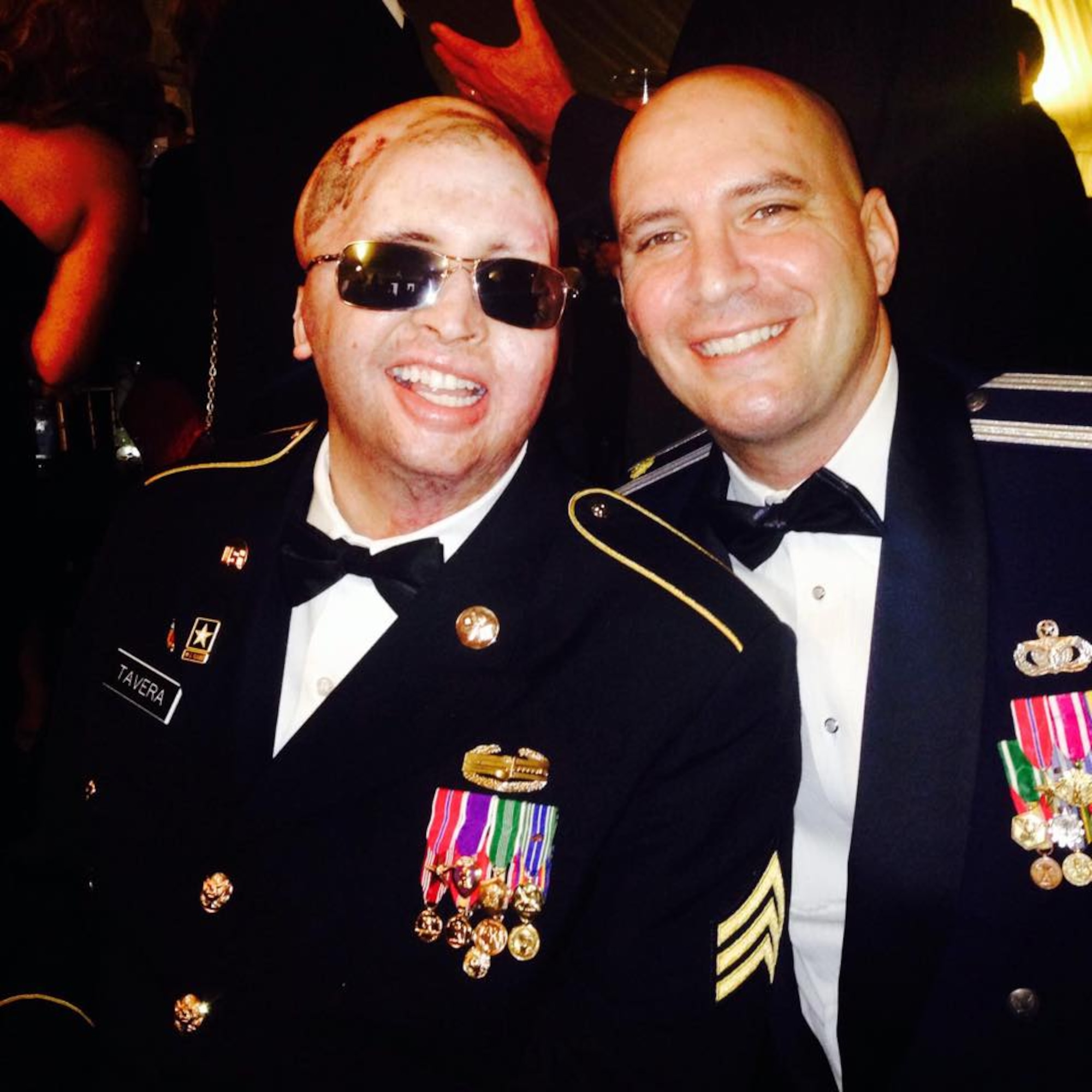 Air Force Lt. Col. Kevin Lombardo, 341st Missile Security Forces Squadron commander, then Maj. Lombardo, right, poses for a photo with Army Sgt. Joel Tavera at a military ball.