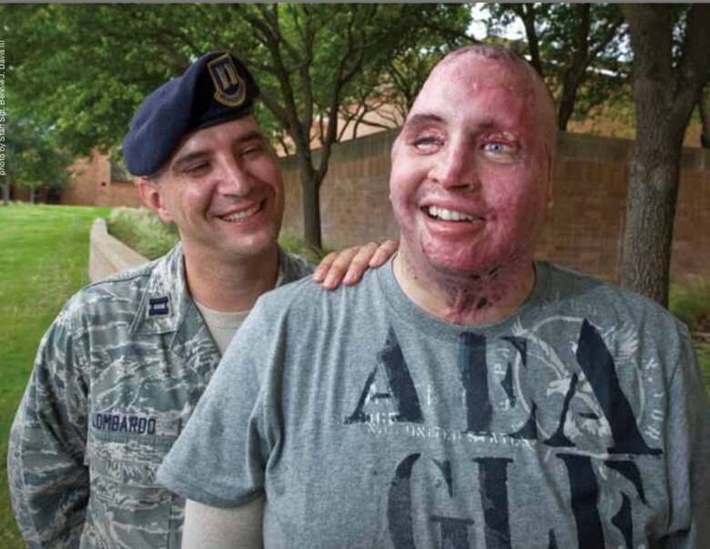 Air Force Lt. Col. Kevin Lombardo, 341st Missile Security Forces Squadron commander, then Capt. Lombardo, left, poses for a photo with Army Spc. Joel Tavera.