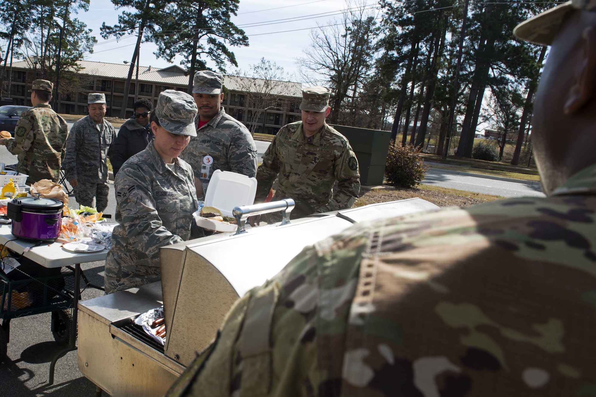 Members assigned to the 20th Medical Group have a cookout outside 20th Medical Group building at Shaw Air Force Base, Feb. 1, 2019.