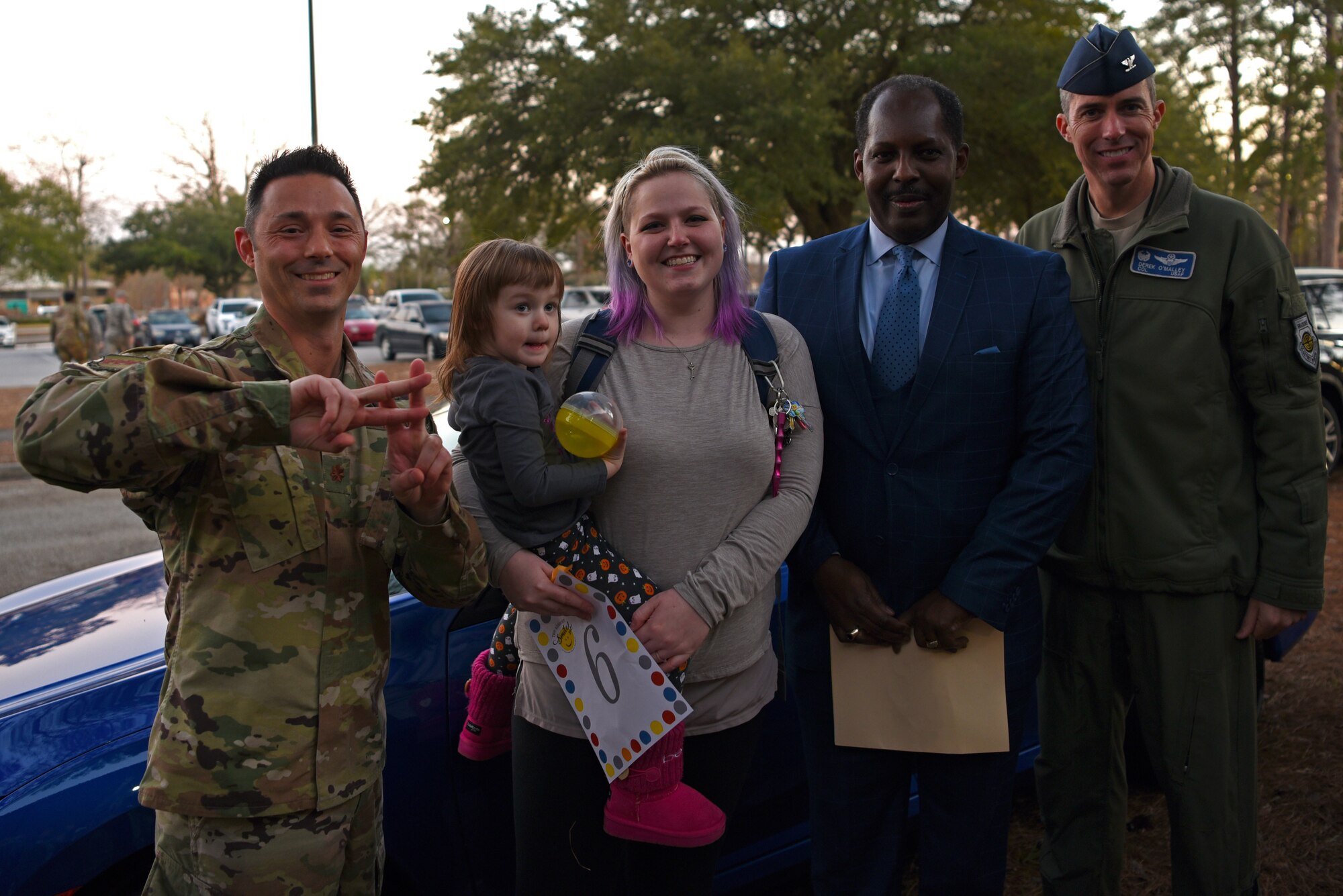 Staci Farland, Team Shaw spouse, center, won a free car during a Smile Campaign car giveaway wrap-up party at Shaw Air Force Base, S.C., Jan. 31, 2019.