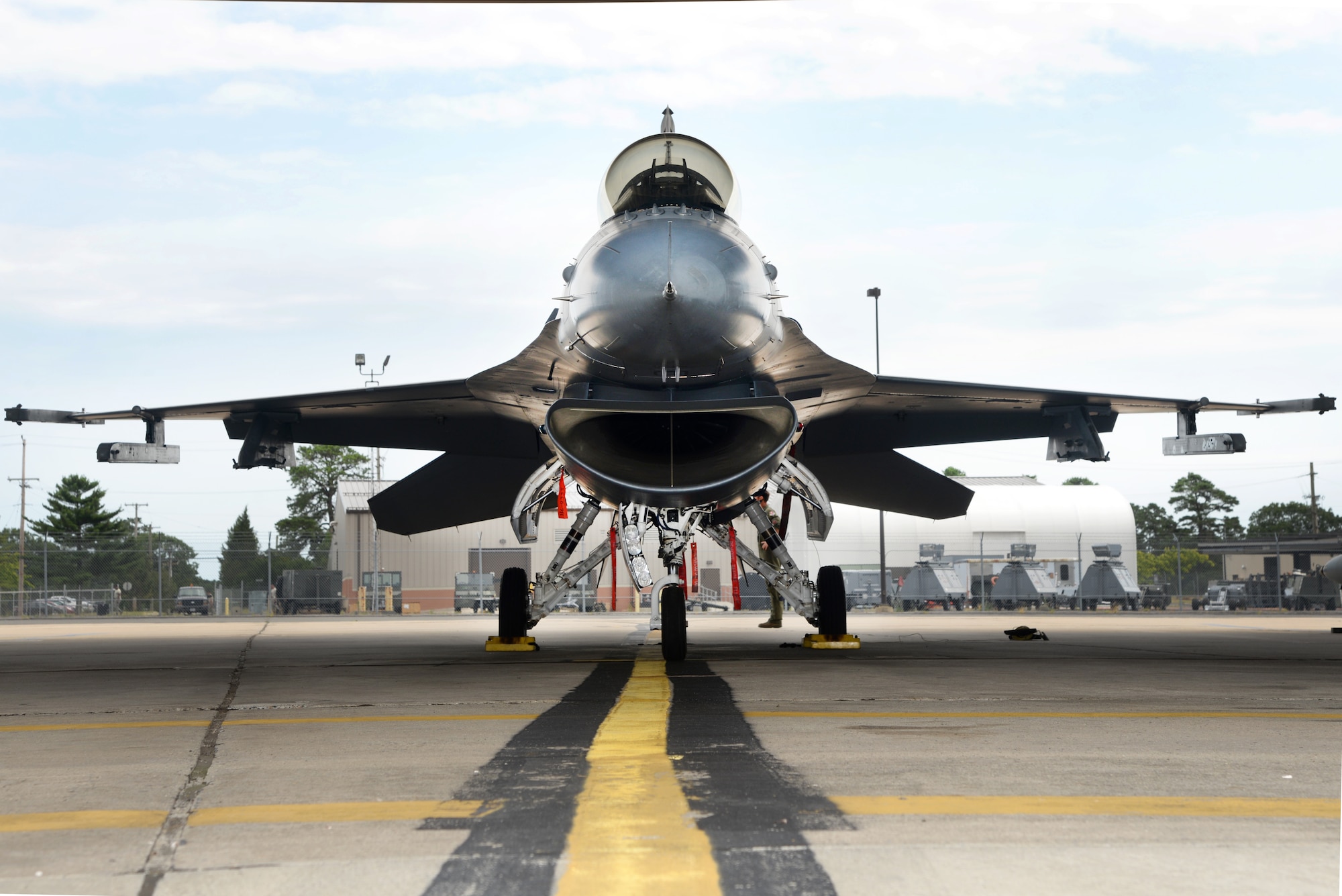 A picture of an F-16C Fighting Falcon from the 177th Fighter Wing on the flight line.