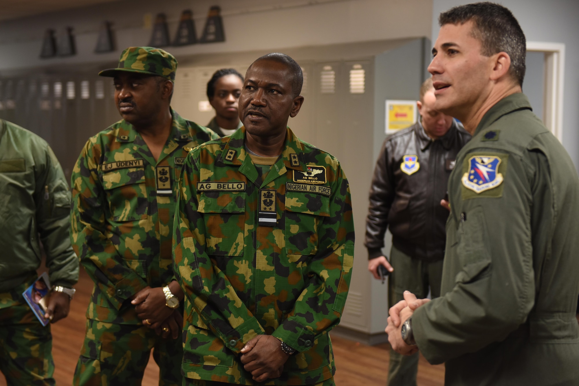 Air Vice-Marshal Aliyu Bello, director of training for the Nigerian Air Force, center, speaks with Lt. Col. Nathan Smith, 50th Flying Training Squadron commander Jan. 23, 2019, on Columbus Air Force Base, Mississippi. Bello and his team visited Columbus AFB to see how their student pilot was progressing in her training. (U.S. Air Force photo by Senior Airman Beaux Hebert)
