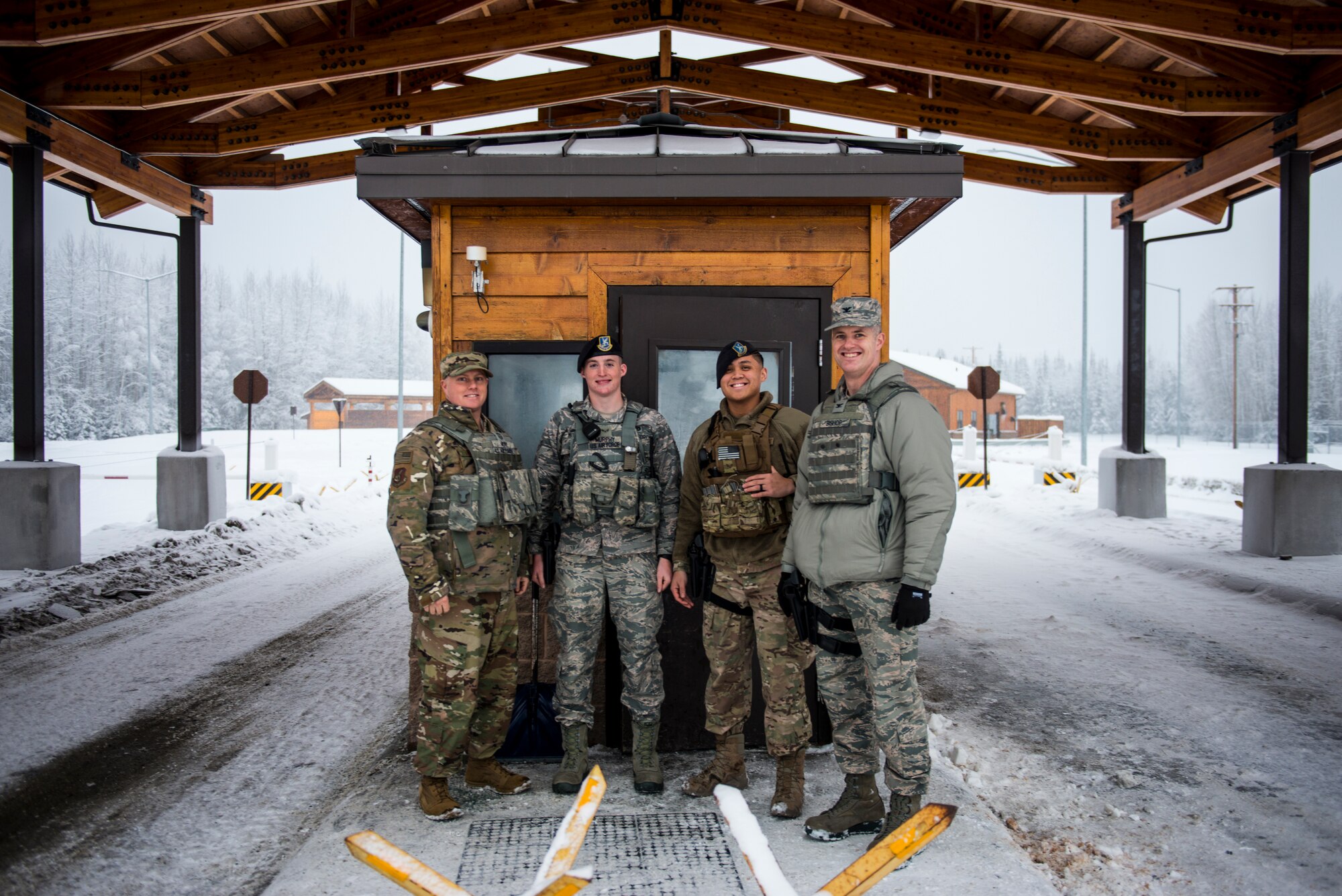 U.S. Air Force Col. Benjamin Bishop, the 354th Fighter Wing commander, participates in a scenario on the MILO Range system with a 354th Security Forces Squadron Airman Jan. 29, 2018, at Eielson Air Force Base, Alaska. Bishop experienced first-hand how the simulator helps prepare Airmen for scenarios they can possibly run into. (U.S. Air Force photo by Senior Airman Isaac Johnson)