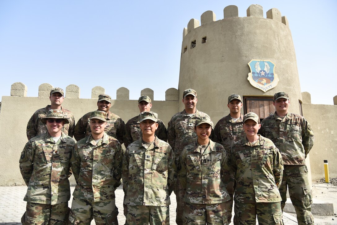 The Coalition for Awareness, Response and Empowerment Team poses for a photo at Al Dhafra Air Base, United Arab Emirates, Jan. 30, 2019. The C.A.R.E. Team consists of personnel from the 380th Expeditionary Medical Group Mental Health flight, the 380th AEW Chapel, Equal Opportunity and Sexual Assault Prevention and Response teams. (U.S. Air Force photo by Senior Airman Mya M. Crosby)