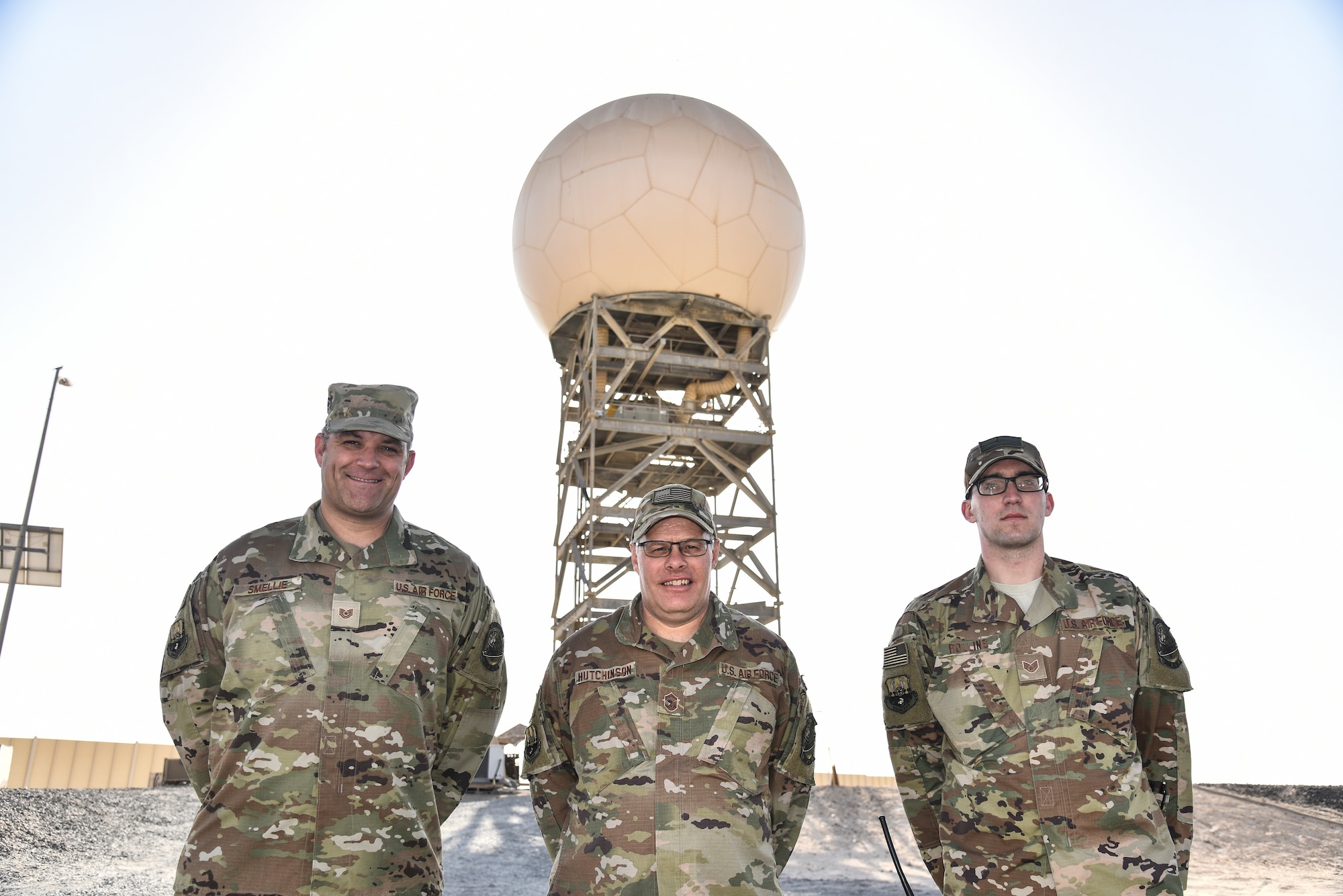 From left, U.S. Air Force Tech. Sgt. Steven Smellie, 727th Expeditionary Air Control Squadron radar maintenance technician; Senior Master Sgt. Martin Hutchinson, 727th EACS NCO in charge of radar maintenance; and Staff Sgt. Evan Rollins, 727th EACS electric protection technician, pose for a photo at Al Dhafra Air Base, United Arab Emirates, Jan. 31, 2019. The 727th Expeditionary Air Control Squadron, also known as the “Kingpin,” is a non-stop shop, comprised of a plethora of assets ranging from the men and women communicating critical information to the radars providing a real-time sight picture of the mission at hand.(U.S. Air Force photo by Senior Airman Mya M. Crosby)