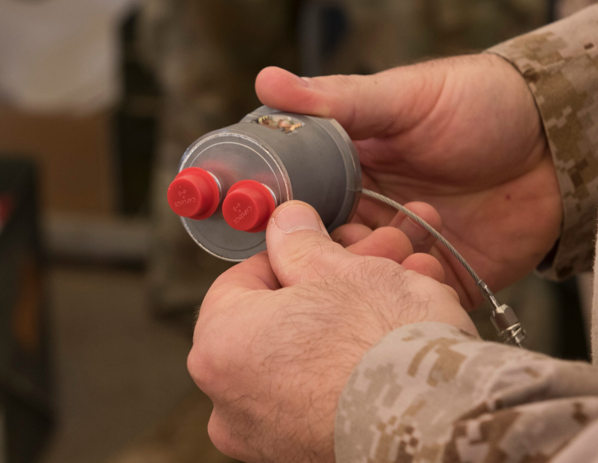 U.S Air Force Munitions crew invite Marines to build bombs in support of OIR