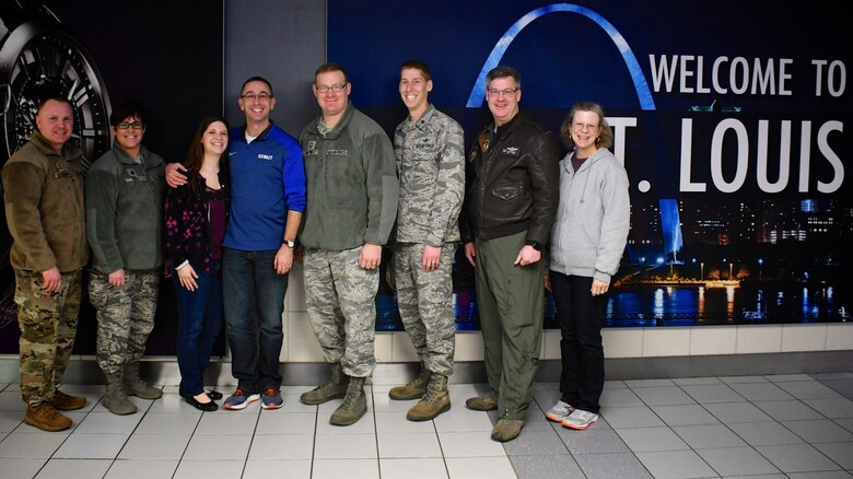 Several 932nd Airlift Wing members got out on a cold evening and welcomed back returning Airmen recently, including deployer and unit Chaplain (Maj.) Michael Williams, in blue shirt. He was greeted with applause, hugs and verbal greetings of appreciation upon his arrival back in Illinois on January 27, 2019.  Various members of the wing staff, public affairs, medical, family readiness and operations were represented. Although tired from the long trip back, the chaplain expressed gratitude and thankfulness to those on hand.  The 932nd AW is a 22nd Air Force unit flying the C-40 aircraft under Air Force Reserve Command and is located at Scott Air Force Base, Illinois.  Citizen Airmen like Maj. Williams come from 37 different states to train with the 932nd AW.  (U.S. Air Force photo by Lt. Col Stan Paregien)