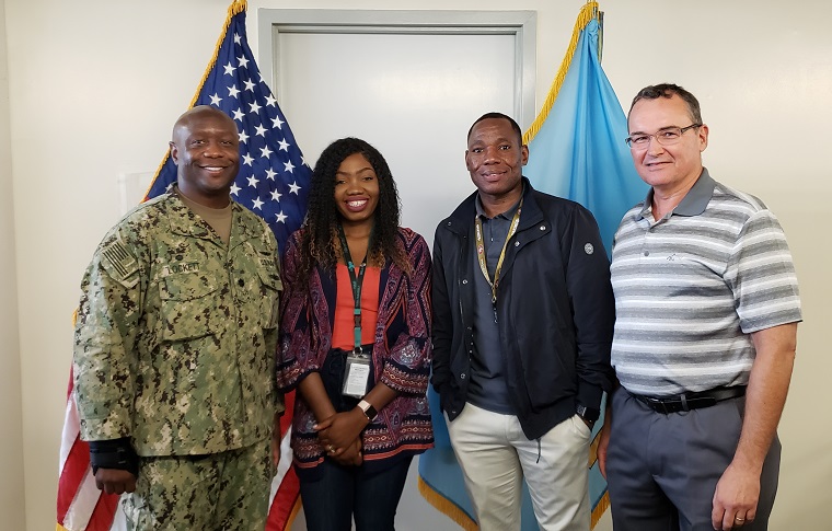 Latasha McGee stands with her leadership DLA Energy Hawaii Commander