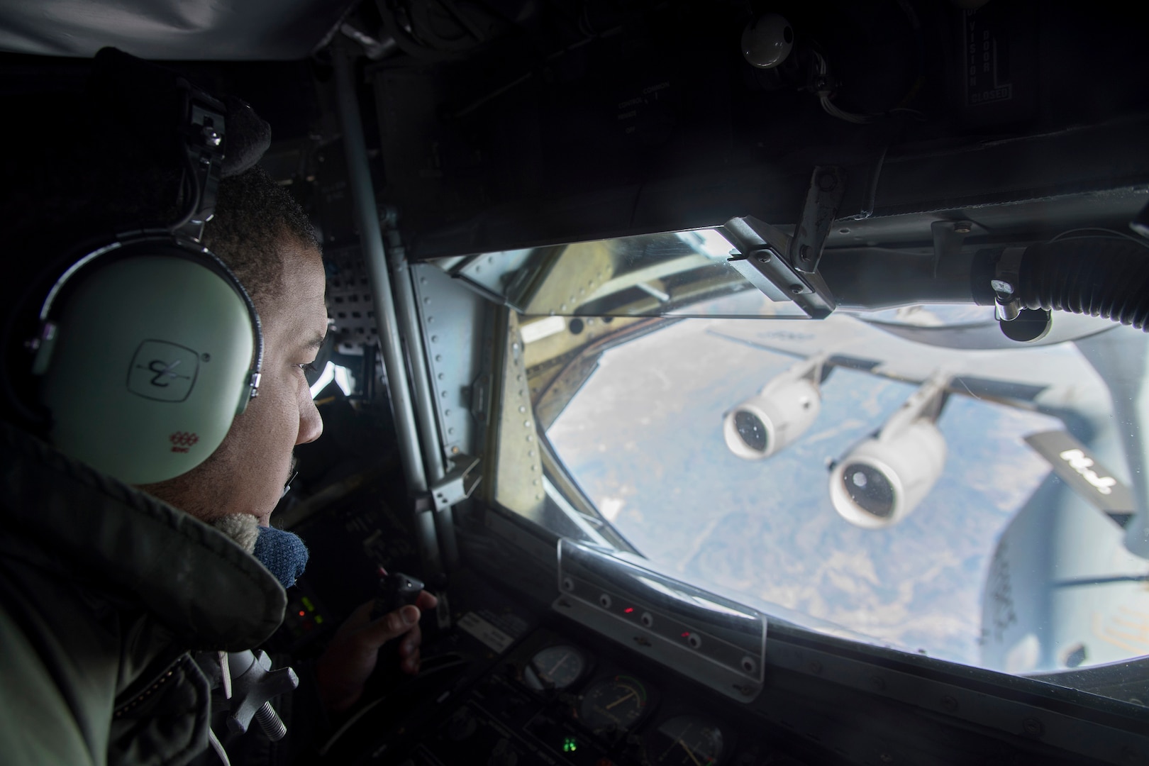 New Jersey Air National Guard Staff Sgt. Vince Stokes, a boom operator with the 141st Air Refueling Squadron, refuels a C-17 Globemaster III from Joint Base Charleston, S.C., over the continental U.S., Jan. 28, 2019. The KC-135R Stratotanker from Joint Base McGuire-Dix-Lakehurst, N.J., is flown by the 141st ARS from the 108th Wing.