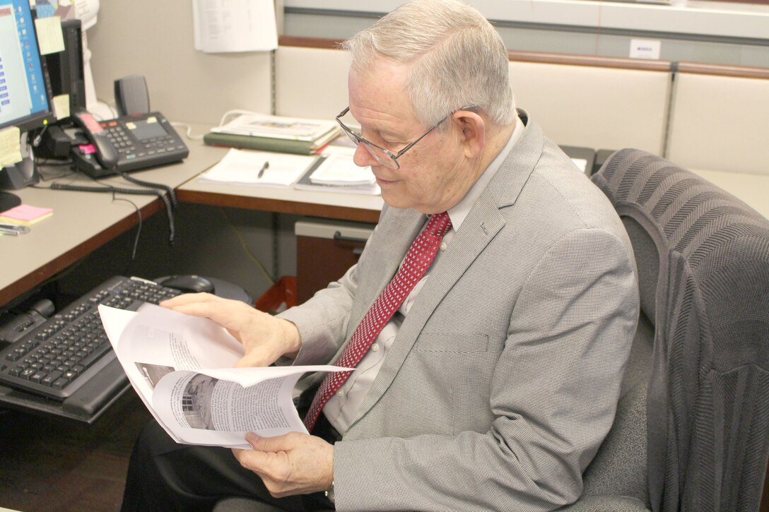 Dr. Bill Baker is now serving as Technical Director for the AEDC Test Operations Division at Arnold Air Force Base. Baker, formerly the chief of the Technology Analysis and Evaluation Branch at Arnold Air Force Base, is pictured here working at his desk at Arnold AFB. (U.S. Air Force photo by Deidre Ortiz)