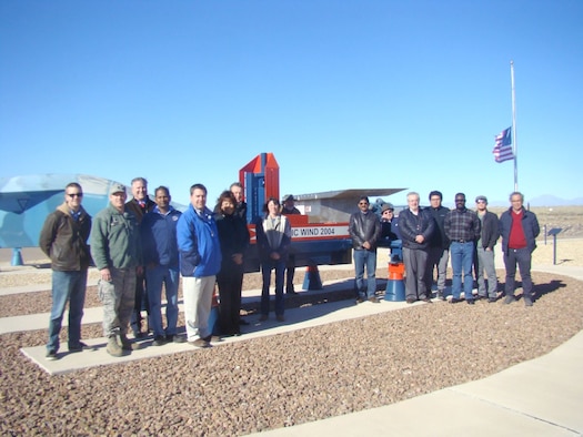 The 704th Test Group’s Holloman High Speed Test Track, operated by the 846th Test Squadron, recently hosted a group of scientists and engineers from the University of Texas at El Paso (UTEP) at Holloman Air Force Base, New Mexico. The 704th Test Group leadership and staff from UTEP used this visit as an opportunity to discuss ways the two groups could collaborate. Pictured from left are Bryan Sinkovec, Lt. Col Mathew Wroten, Commander 846 TS; Robert Kirken, dean, College of Science at UTEP; Vinod Kumar; Robert Edmonds; Theresa Maldonado, dean, College of Engineering at UTEP; Bob Currey; Michelle Zeisset; Gregory Mckinzey; Ramana Chintalapalle; Thomas Gill; Carlos Ferregut; Arturo Rodriguez; Richard Adansi; Jose Terrazas; and Eduardo Quinonez-Rico. (Courtesy photo)