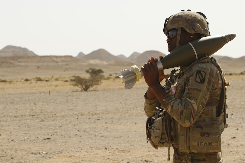 Sgt. Quindarius Martin of 2nd Battalion, 198th Armored Regiment, 155th Armored Brigade Combat Team, Mississippi National Guard, prepares a 120mm mortar round for fire in Rabkoot, Oman, Jan. 28, 2019. The U.S. Army and the Royal Army of Oman are spending days training side-by-side during exercise Inferno Creek 19. The bilateral exercise was designed to strengthen relations between the two militaries. It is an opportunity for both militaries to build tactical proficiency and gain shared understanding of each other’s forces and support long-term regional stability.