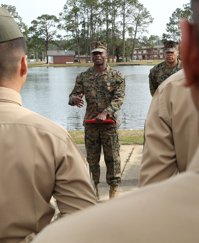 LOGCOM Marine receives promotion, medal