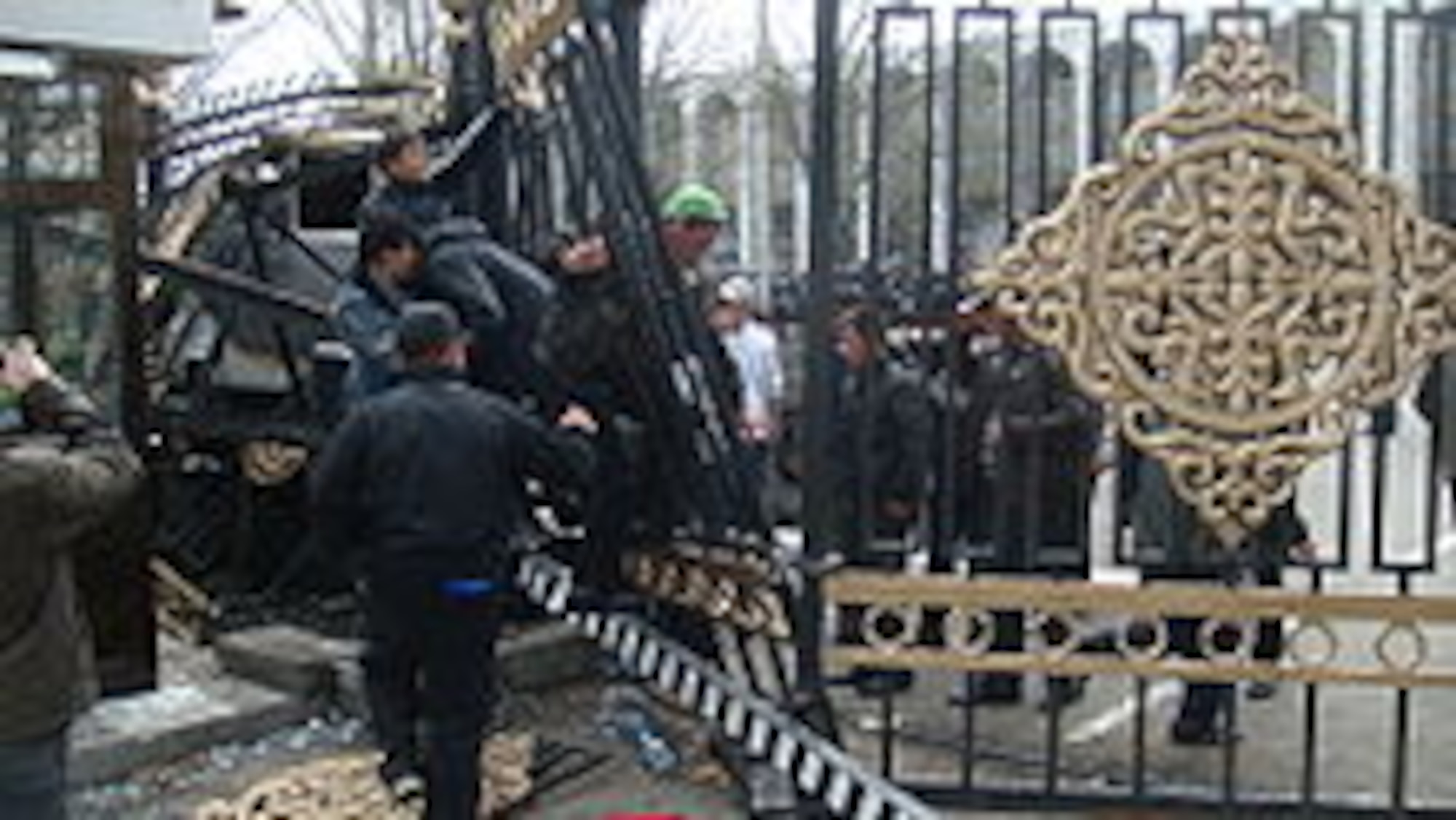 Kyrgyz entering the otherwise-closed White House lawn following protests in Bishkek on April 7, 2010.