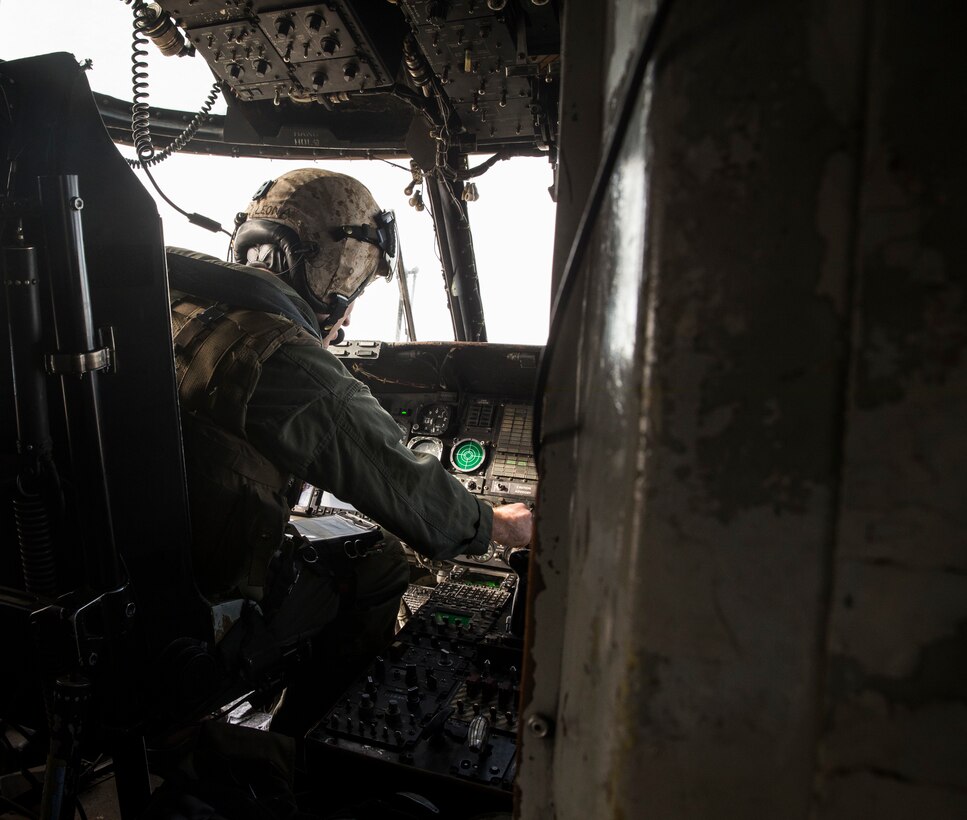Capt. Chris Leona, a CH-53E Super Stallion pilot for Marine Heavy Helicopter Squadron (HMH) 466, Marine Aircraft Group (MAG) 11 performs a preflight function check before a training exercise known as the ‘Elephant Walk’ on Marine Corps Air Station Miramar, Calif., Feb. 1.   MAG-11 conducted this training to exercise its real-world capabilities. Exercises such as this provide realistic, relevant training necessary for 3rd MAW to “Fix, Fly, and Fight” as the Marine Corps’ largest aircraft wing and ensures the unit remains combat-ready, inter-operable, deployable on short notice, and lethal when called into action.(U.S. Marine Corps photo by Sgt. Sarah Ralph)
