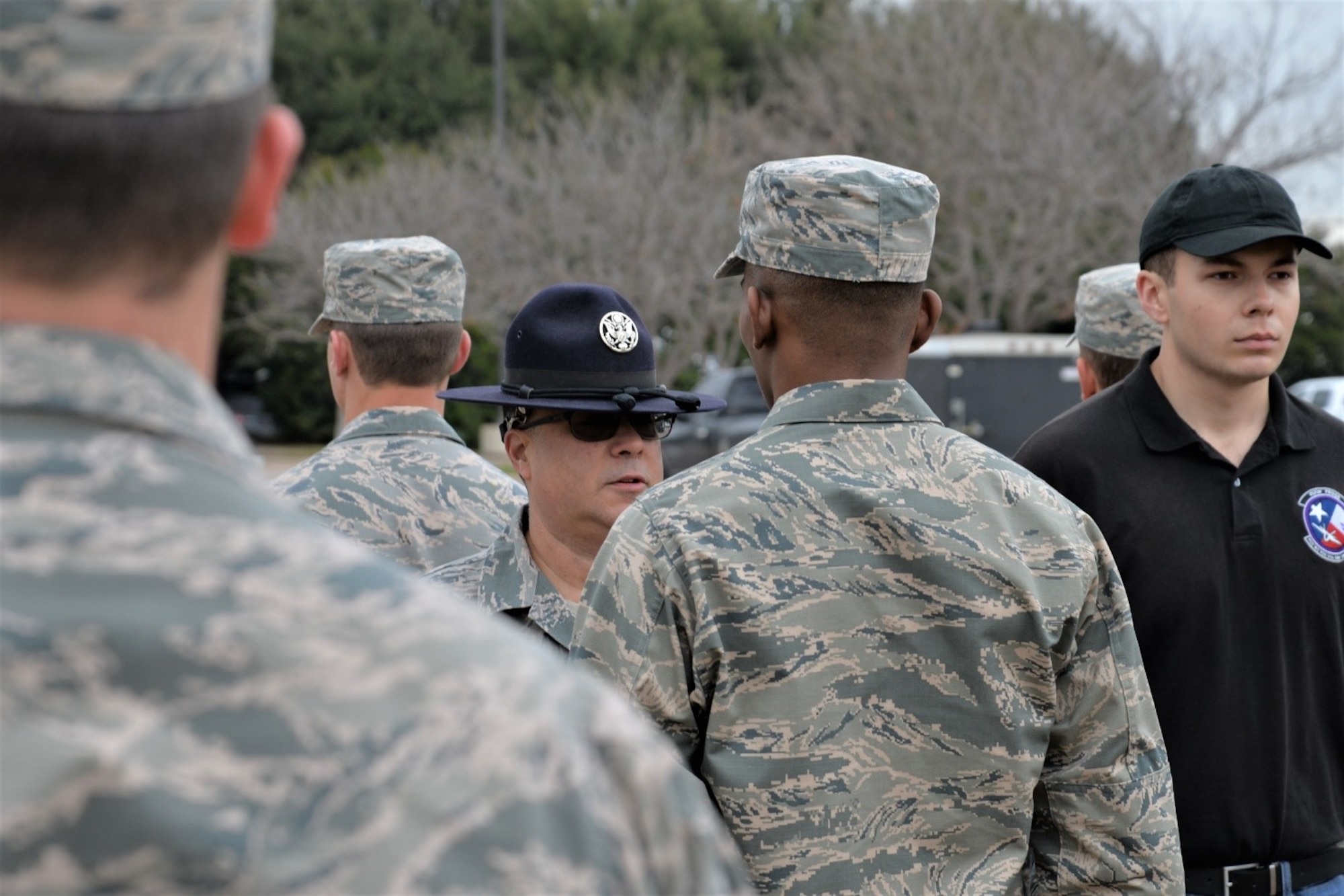 Master Sgt. Edward Rivera, a military training instructor with the 433rd Training Squadron at Joint Base San Antonio-Lackland, instructs AFROTC Det. 845 cadets at Texas Christian University, Fort Worth, Texas, on proper military drill, ceremony, customs and courtesies, leadership, and teamwork.  (Photo by Clayton Church, US Army Corps of Engineers)
