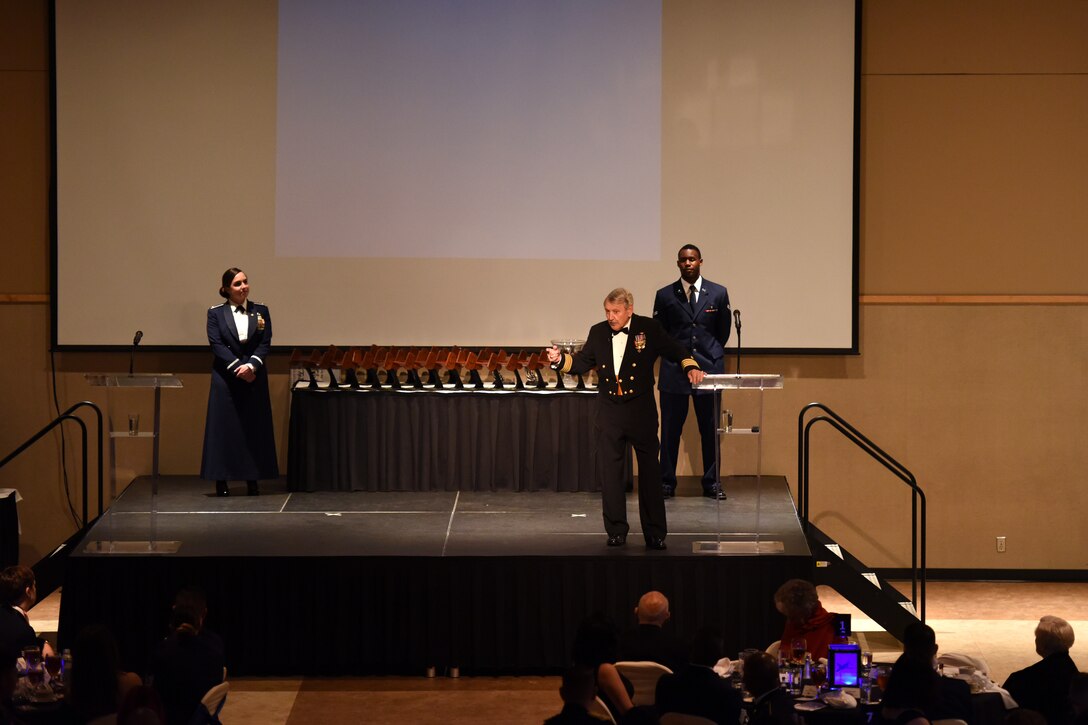Retired U.S. Navy Capt. John Smith speaks to the crowd during the Annual Awards Ceremony at the McNeese Convention Center in San Angelo, Texas, Feb. 1, 2019. Smith was the guest speaker for the event and shared his experiences throughout his career. (U.S. Air Force photo by Airman 1st Class Zachary Chapman/Released)