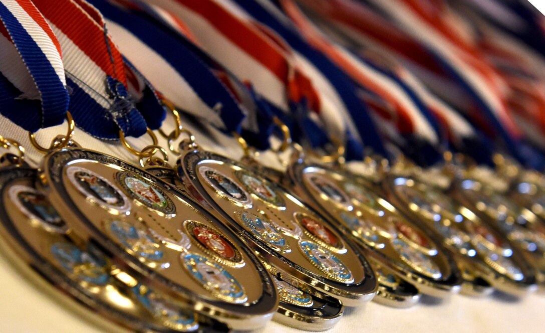 Medallions are displayed on a table for the nominee of the Annual Awards Ceremony at the McNeese Convention Center, San Angelo, Texas, Feb. 1, 2019.  The medallions were distributed to award nominees prior to the ceremony in order for the nominee to be distinguished throughout the night. (U.S Air Force photo by Airman 1st Class Abbey Rieves/Released)