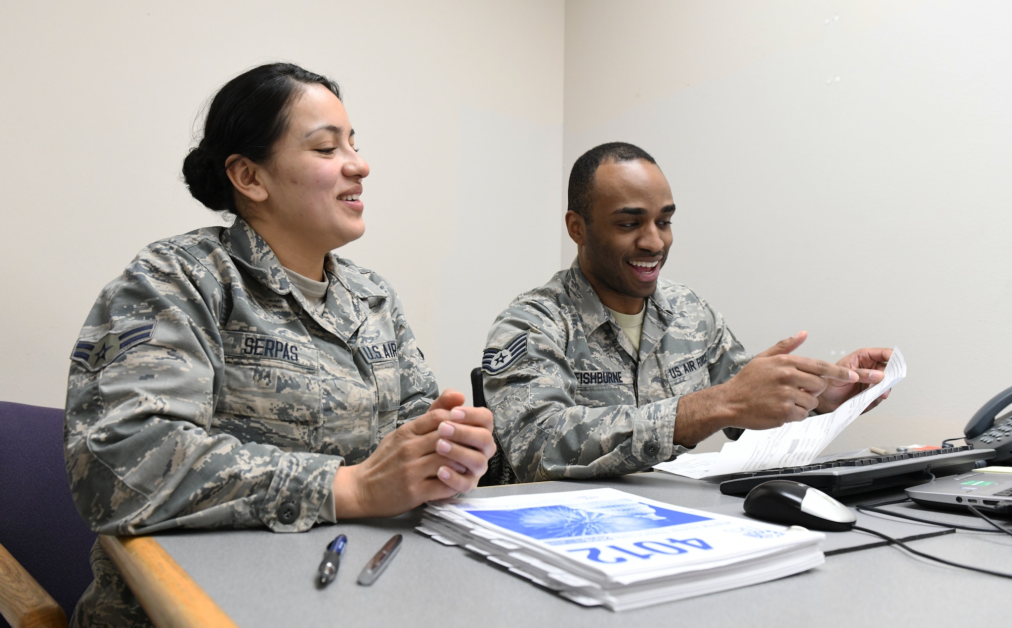 Volunteers at the tax center fill out their tax forms at Ellsworth Air Force Base, S.D., Feb. 1, 2019. The tax center is open to help base members, retirees and military families prepare and file their 2018 tax forms free of charge. U.S. Air Force photo by Airmen 1st Class Thomas Karol)