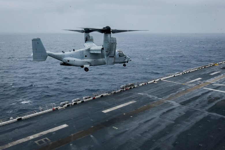 EAST CHINA SEA (Feb. 5, 2019) An MV-22B Osprey tiltrotor aircraft, assigned to Marine Medium Tiltrotor Squadron (VMM) 262 (Reinforced) with the embarked 31st Marine Expeditionary Unit (MEU), prepares to land on the flight deck of the amphibious assault ship USS Wasp (LHD 1) during a visit between U.S. and Japan military officials to observe operations at sea. Wasp, flagship of the Wasp Amphibious Ready Group, with embarked 31st MEU, is operating in the Indo-Pacific region to enhance interoperability with partners and serve as a ready-response force for any type of contingency.