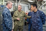 EAST CHINA SEA (Feb. 5, 2019) Commander of U.S. 7th Fleet, Vice Adm. Phil Sawyer (center), and Commander in Chief of Self Defense Fleet, Japan Maritime Self Defense Force (JMSDF), Vice Adm. Kazuki Yamashita (right) meets with the Commanding Officer of the amphibious assault ship USS Wasp (LHD 1), Capt. Colby Howard, during a visit between U.S. and Japan military officials to observe amphibious operations at sea. Wasp, flagship of the Wasp Amphibious Ready Group, with embarked 31st Marine Expeditionary Unit, is operating in the Indo-Pacific region to enhance interoperability with partners and serve as a ready-response force for any type of contingency.