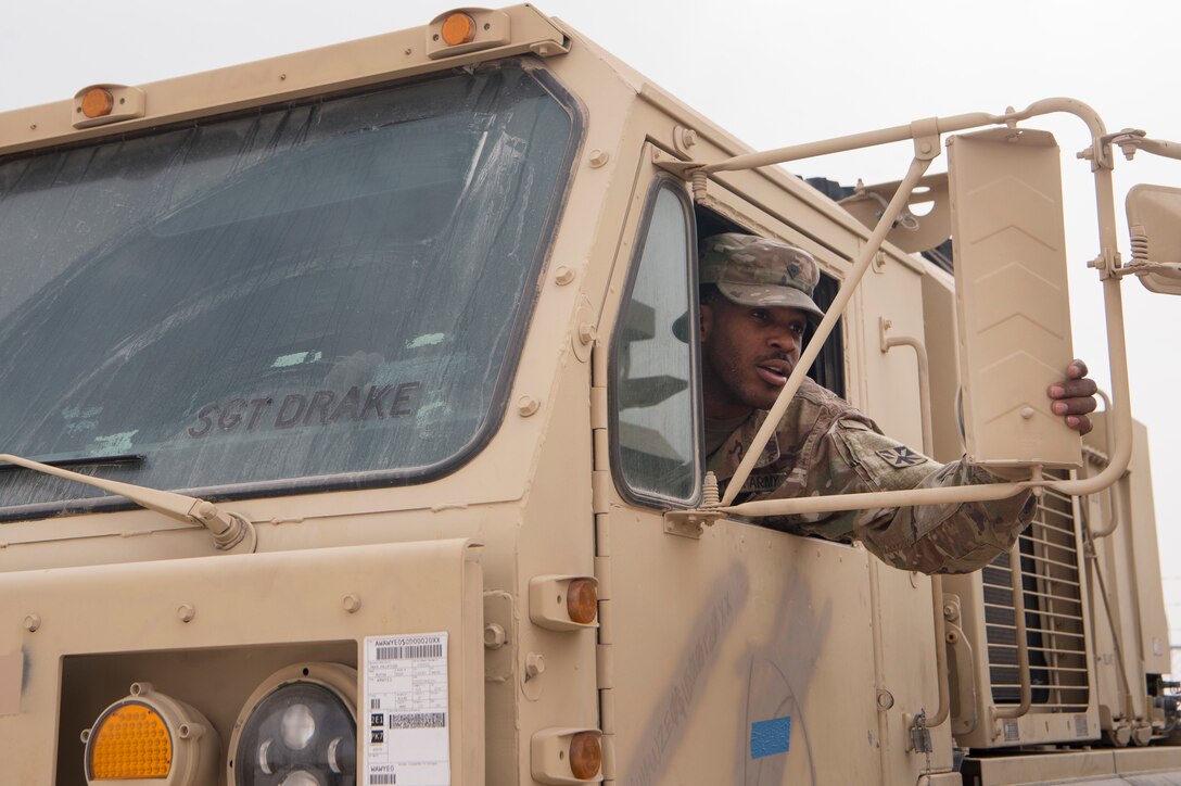 U.S. Army Spc. Jaylyn Wilson, Echo Company, 1st Battalion, 43rd Air Defense Artillery (ADA) Battalion, 11th ADA Brigade wheeled vehicle mechanic, conducts an operations check on a Palletized Load System truck Jan. 29, 2019, at Al Udeid Air Base, Qatar. Soldiers of Echo Company perform mechanical work and repairs for various equipment and assets that support Al Udeid’s air defense capabilities, including surface-to-air missile systems. (U.S. Air Force photo by Tech. Sgt. Christopher Hubenthal)