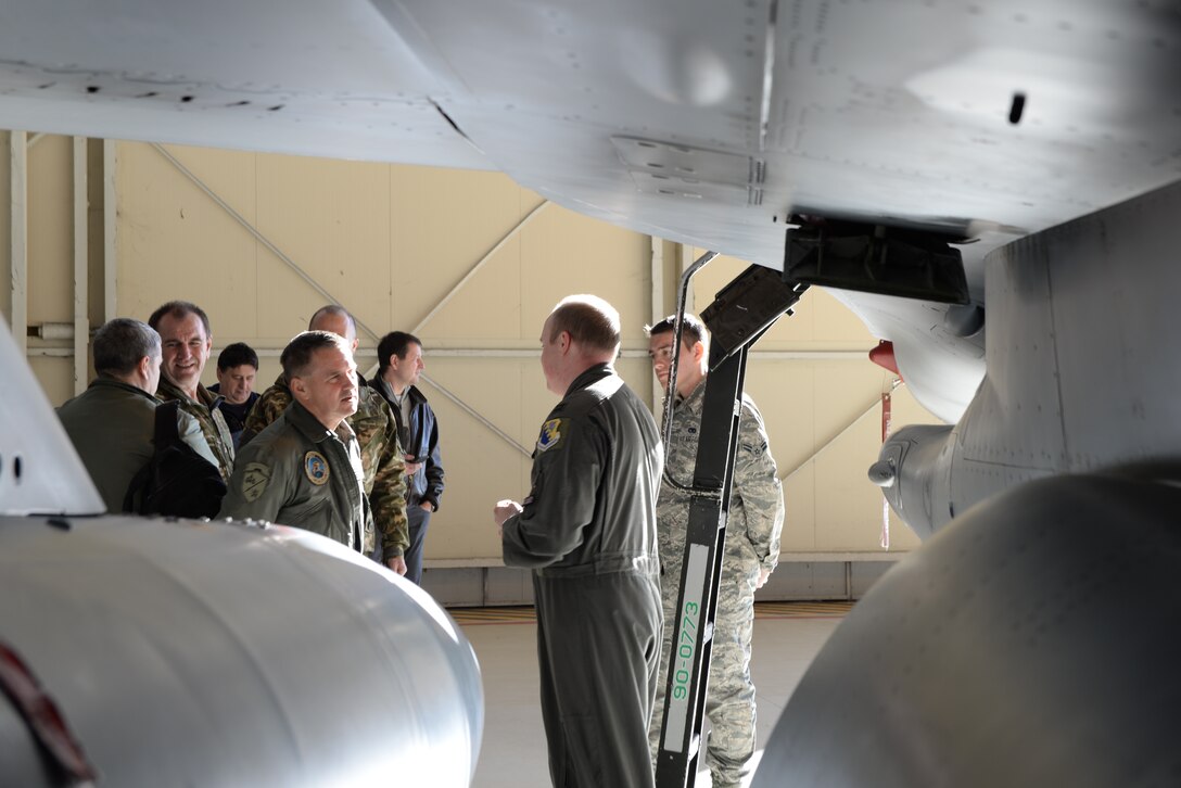 Slovenian Armed Forces leaders tour an F-16 Fighting Falcon, Jan. 22, 2019, at Aviano Air Base, Italy.