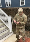 Members of the Rhode Island National Guard go door to door to inform and assist the community after a gas line issue left 7,000 homes in Newport and Middletown without heat on Thursday, January 24, 2019.  The Rhode Island National Guard was part of a multi-agency response to the incident after the Governor declared a state of emergency.  The RING went door to door to check on the health and welfare of the affected communities and keep them up to date as the repairs to the system progressed.  (U.S. Army National Guard photo by Capt. Mark Incze)