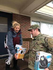 Members of the Rhode Island National Guard go door to door to inform and assist the community after a gas line issue left 7,000 homes in Newport and Middletown without heat on Thursday, January 24, 2019.  The Rhode Island National Guard was part of a multi-agency response to the incident after the Governor declared a state of emergency.  The RING went door to door to check on the health and welfare of the affected communities and keep them up to date as the repairs to the system progressed.  (U.S. Army National Guard photo by Capt. Mark Incze)