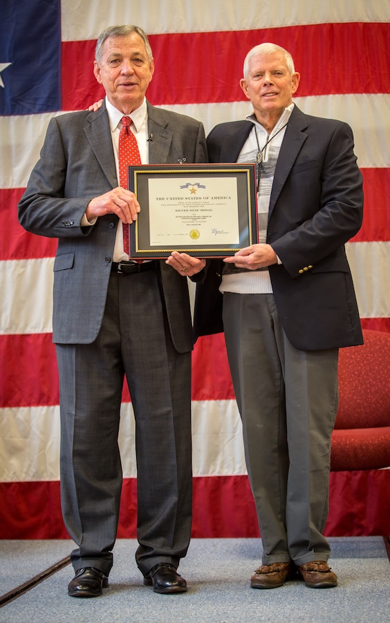Retired Maj. Edward F. Wright (left) and retired Maj. Gen. John Admire (right) pose for a photo at Portland, Ore., Feb. 1, 2019. Wright was awarded the medal for his actions on Aug. 21, 1967, when he led a reaction force against North Vietnamese forces that had ambushed an Army convoy and pinned down his company commander’s relief force. While exposed to intense enemy fire, Wright’s tactical skills and placement of fire support enabled his force to steadily advance and rescue the besieged Soldiers and Marines. Wright was a second lieutenant serving with Lima Company, 3rd Battalion, 3rd Marine Regiment in the Republic of Vietnam at the time. (U.S. Marine Corps photo by Sgt. Andy O. Martinez)