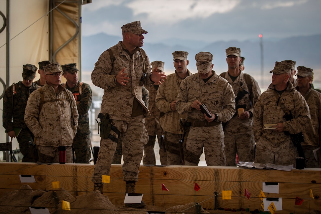 U.S. Marine Lt. Col. Ryan B. Cohen, the operations officer of 6th Marine Regiment, Marine Air-Ground Task Force-6 gives staff members guidance during a Rehearsal of Concept drill in preparation for the Regimental Assault Course during Integrated Training Exercise (ITX) 2-19 aboard Marine Corps Air-Ground Combat Center Twentynine Palms, Calif., Feb. 2, 2019. ITX creates a challenging, realistic training environment that produces combat-ready forces capable of operating as an integrated MAGTF. (U.S. Marine Corps photo by Sgt. Victor A. Mancilla)