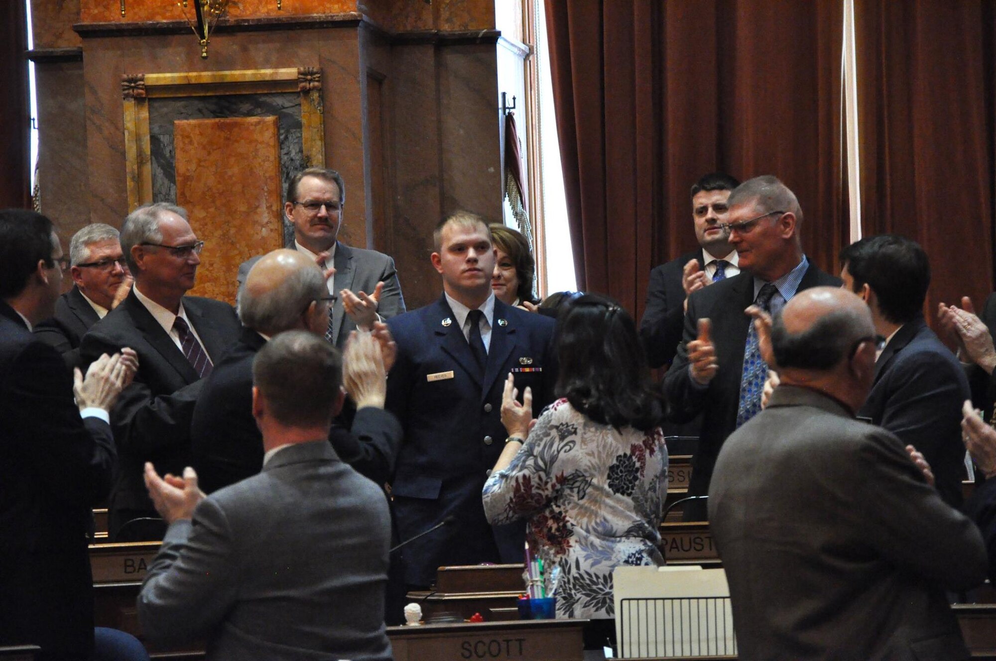 Airman 1st Class Josiah Reeves, cyber transport with the 132d Intelligence Support Squadron (ISS), is recognized by multiple representatives during the Eighty-Eighth General Assembly at the Iowa State Capitol on January 17th, 2019. Reeves was recognized for joining the Air National Guard to take advantage of the Science, Technology, Engineering, and Math (STEM) opportunities and utilizing the tuition assistance. (Iowa National Guard photo by Lt. Col. Timothy Mills)