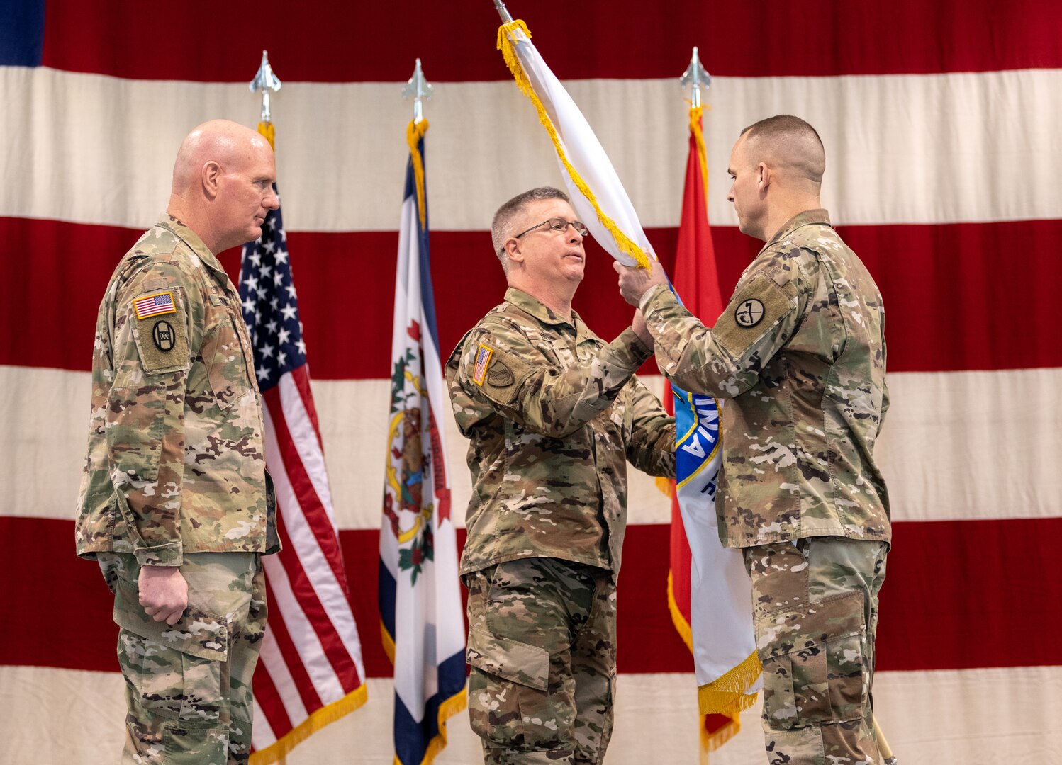 Command Sgts. Maj. James "Dusty" Jones, Phillip Cantrell, and James Allen took part in change of responsibility ceremonies held Feb. 2, 2019 at the WVNG Joint Forces Headquarters in Charleston.