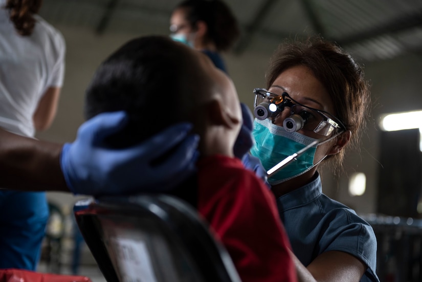 U.S. Army Maj. Margaret Novicio, Medical Element dentist, treats a patient during a medical readiness exercise in El Palmital, Honduras, Jan. 31, 2019.