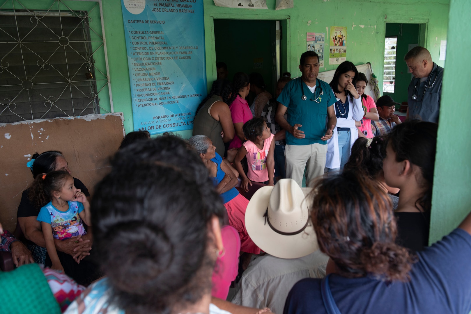 A doctor speaks to awaiting patients at a local clinic in El Palmital, Honduras, Jan. 31, 2019.