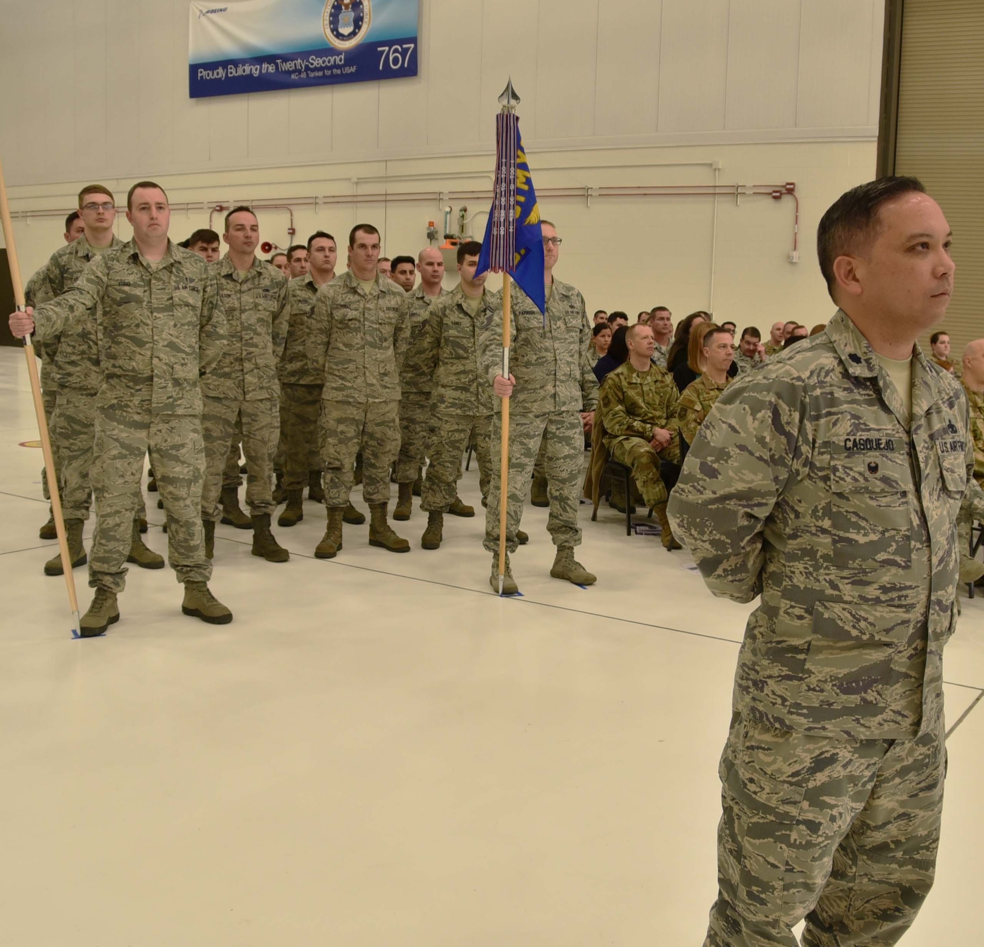Airmen from the 931st Maintenance Group prepare to give their first salute to Col. Robert Thompson, the incoming commander of the 931 MXG, during an official change of command ceremony, Feb. 3, 2019, McConnell Air Force Base, Kan. Thompson replaced Col. Heath Fowler, as the commander of the group.