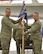 (Left to right) Col. Phil Heseltine, 931st Air Refueling Wing commander, hands the guidon to Col. Robert Thompson, the incoming 931st Maintenance Group commander, during an official change of command ceremony, Feb. 3, 2019, McConnell Air Force Base, Kan. As commander of the 931 MXG, Thompson is directly responsible for the training and readiness of more than 270 Reserve Citizen Airmen.