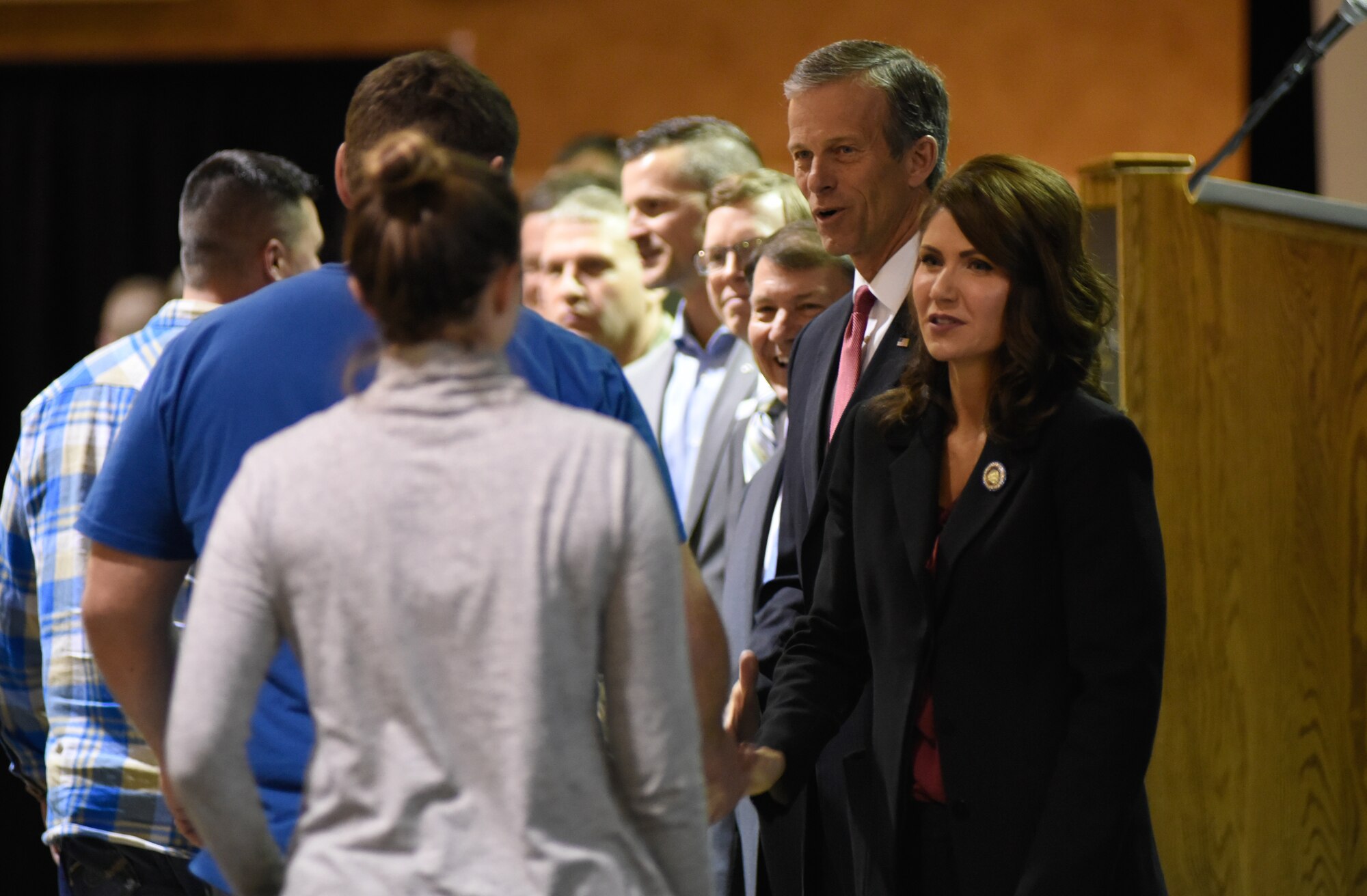 Gov. Kristi Noem, 33rd governor of South Dakota, along with the South Dakota Congressional Delegation and South Dakota National Guard senior leaders, shake the hands and officially welcome home members of the 114th Fighter Wing in Sioux Falls, S.D., Feb. 3, 2019.