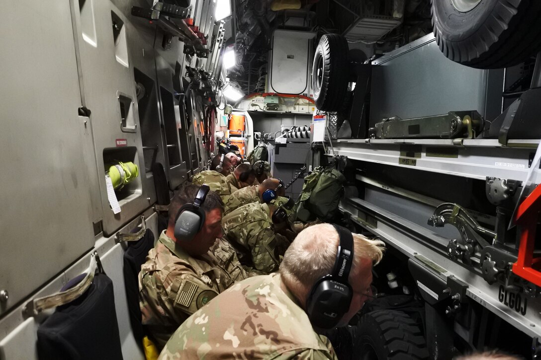 114th Fighter Wing advance team rests during their flight to the Air Expeditionary Force deployment location last July.