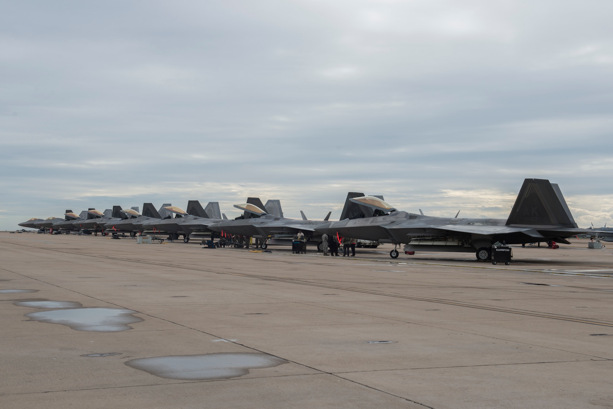 U.S. Air Force F-22 Raptors sit on the flightline prior to takeoff during in-house exercise Patriot Grizzly and joint exercise Winter Fury at Marine Corps Air Station Miramar, San Diego, Calif., Jan. 15, 2019. Both exercises enabled Joint Base Elmendorf-Richardson, Alaska, aircrew and pilots to practice standardized tactics through consistent flying. Winter Fury involved both Marine F/A-18C Hornets, and Navy F-35C Lightning II’s, partnering with F-22s to perform air-to-air combat.