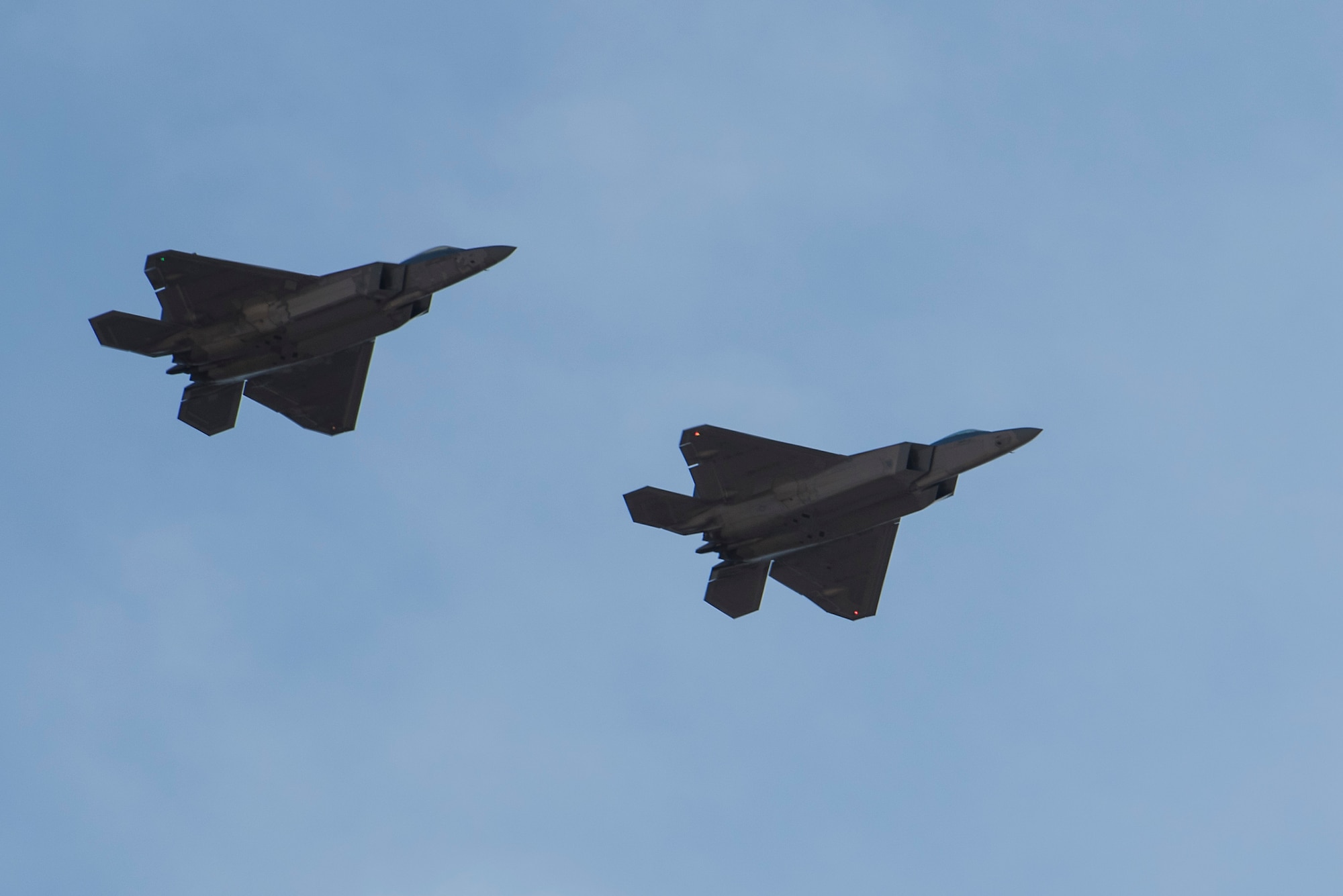 U.S. Air Force F-22 Raptors fly in formation during in-house exercise Patriot Grizzly and joint exercise Winter Fury at Marine Corps Air Station Miramar, San Diego, Calif., Jan. 16, 2019. Both exercises enabled Joint Base Elmendorf-Richardson, Alaska, aircrew and pilots to practice standardized tactics through consistent flying. Winter Fury involved both Marine F/A-18C Hornets, and Navy F-35C Lightning II’s, partnering with F-22s to perform air-to-air combat.
